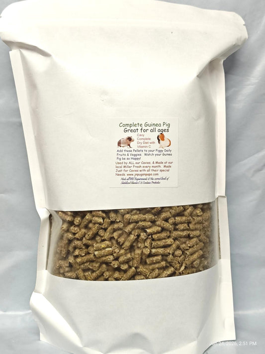 Complete Guinea Pig Food in a sealed bag, suitable for all ages, featuring small pellets.
