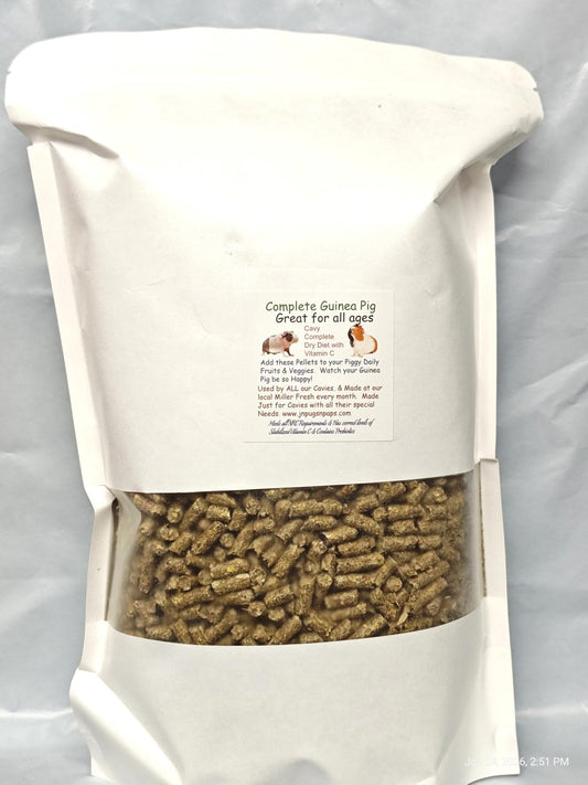 Complete Guinea Pig food in a sealed bag, ideal for all ages, featuring high fiber and essential nutrients.