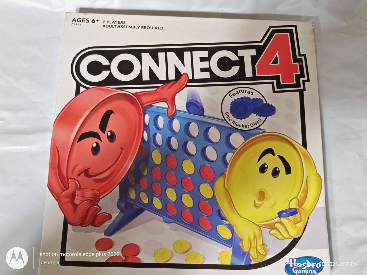 Connect 4 game featuring red and yellow game pieces on a blue grid. Fun for ages 6 and up.