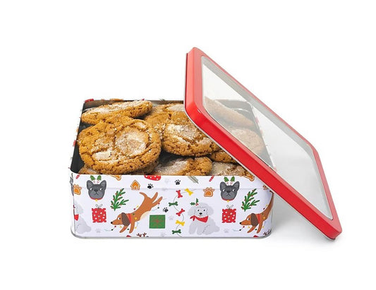 Cookie tin featuring festive animal designs, filled with delicious cookies.