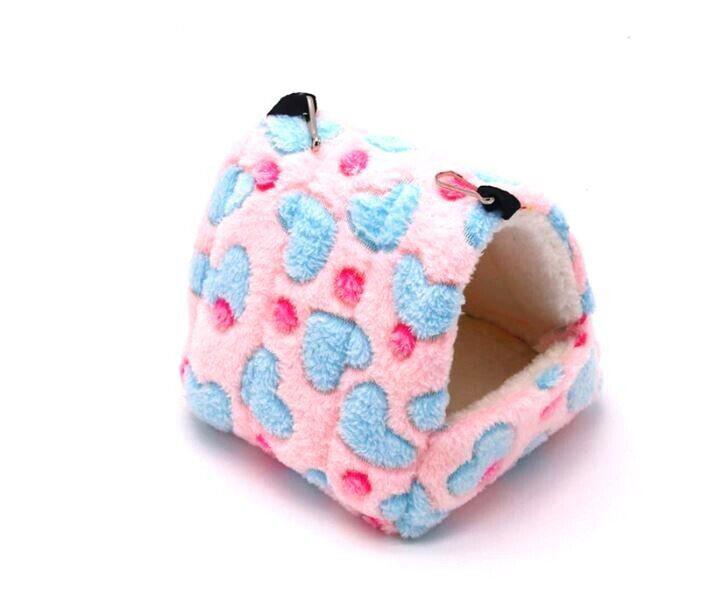Cozy Cat Bed with pink and blue heart patterns, perfect for small pets.