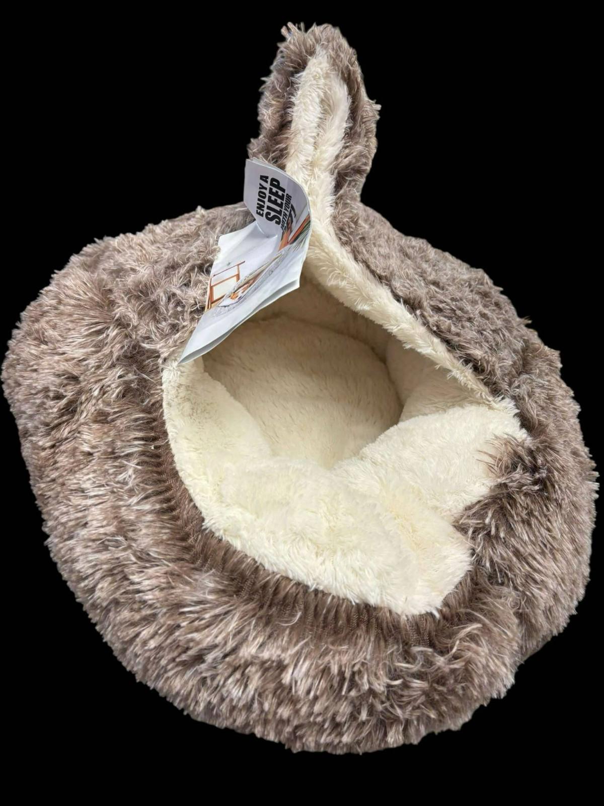 Cozy Cat Cave Bed features soft faux fur and plush interior for comfort.