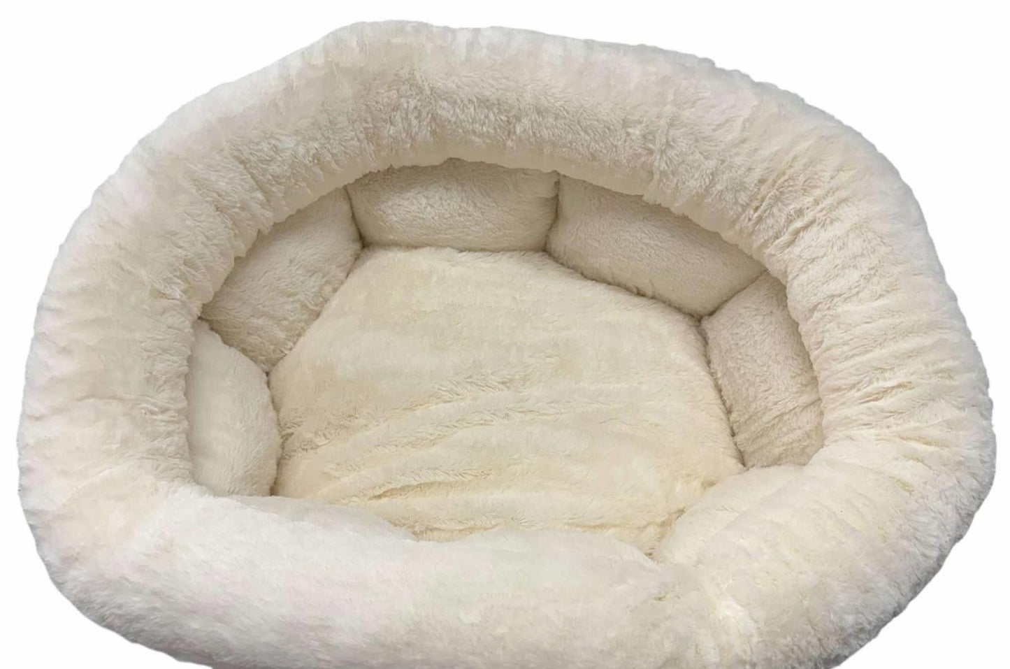 Cozy pet bed featuring a soft, plush interior in cream color for ultimate comfort.