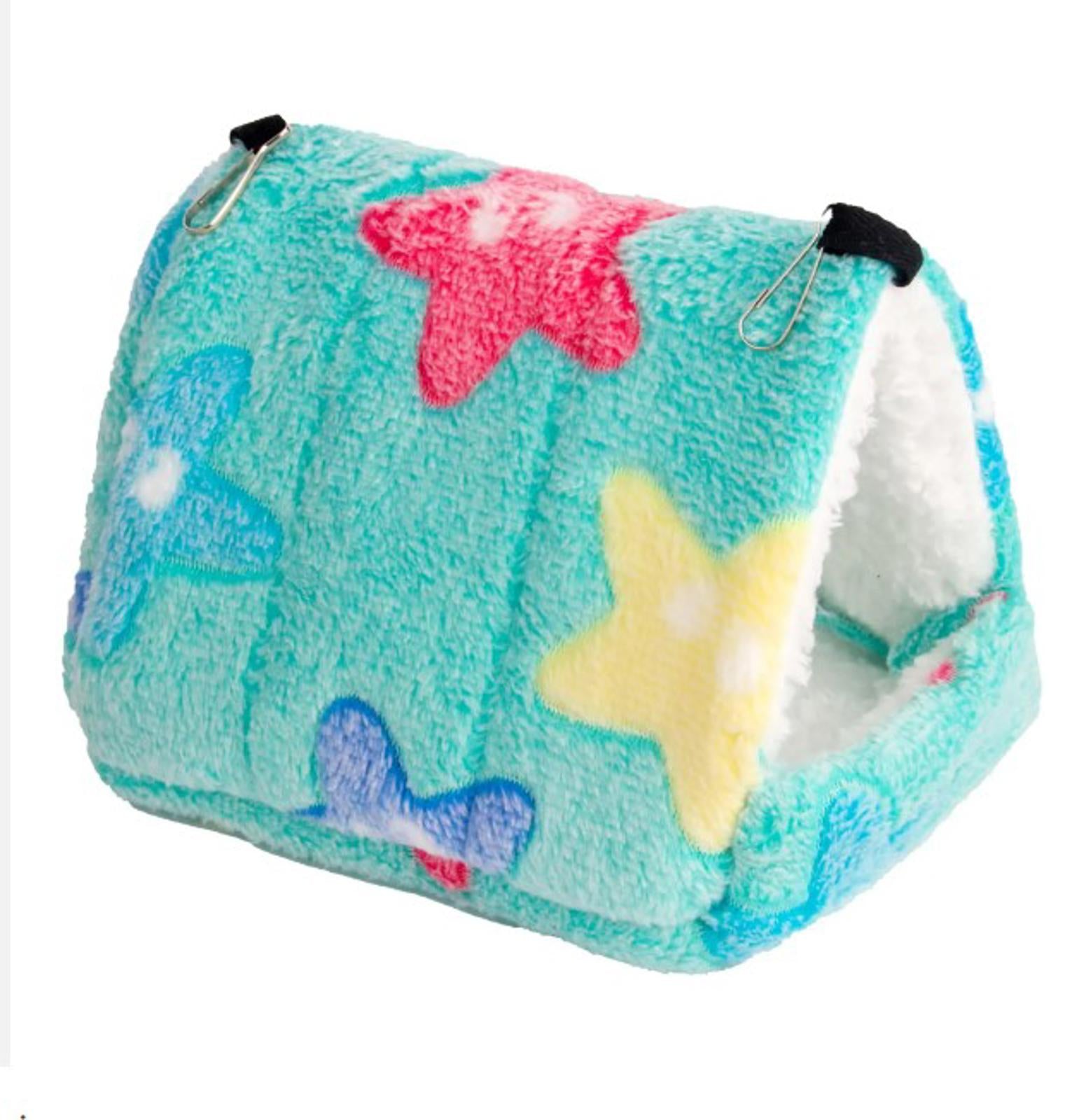 Cozy pet bed with starfish pattern in teal and pastel colors, perfect for small animals.