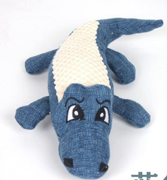 Crocodile Plush Toy featuring a blue fabric body and expressive eyes.