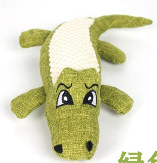 Crocodile Plush Toy featuring a green body and expressive eyes.