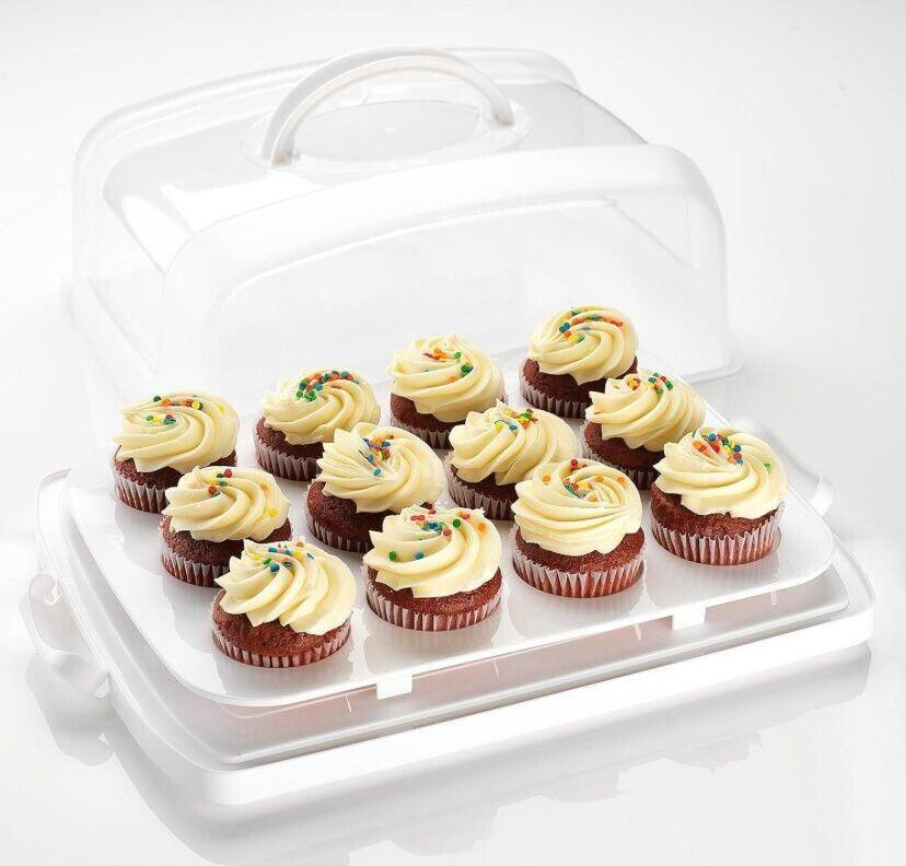 Cupcake carrier with twelve chocolate cupcakes topped with vanilla frosting and colorful sprinkles.