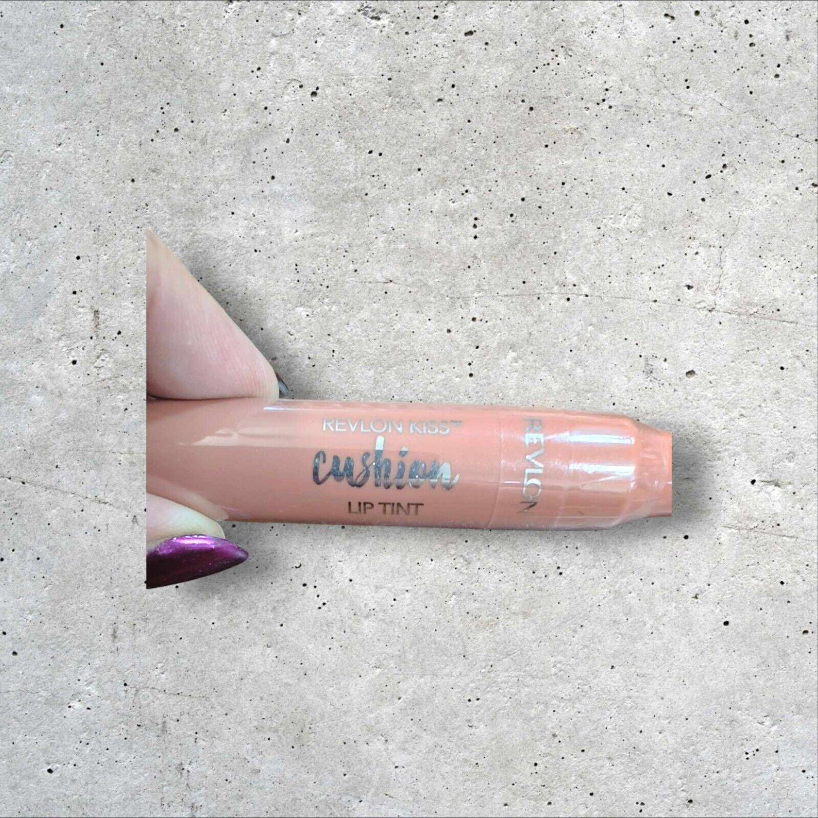 Cushion Lip Tint in a soft peach shade, featuring a sleek design and easy application.