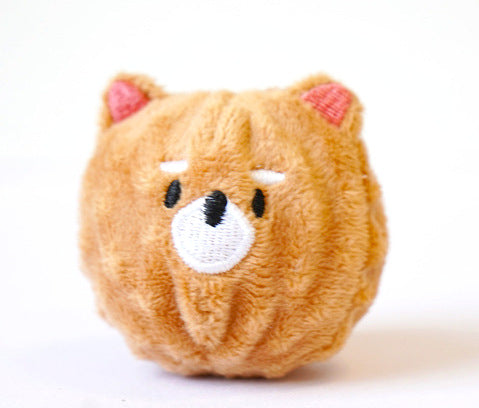 Cute plush bear toy with a round shape and soft texture, featuring embroidered facial details.