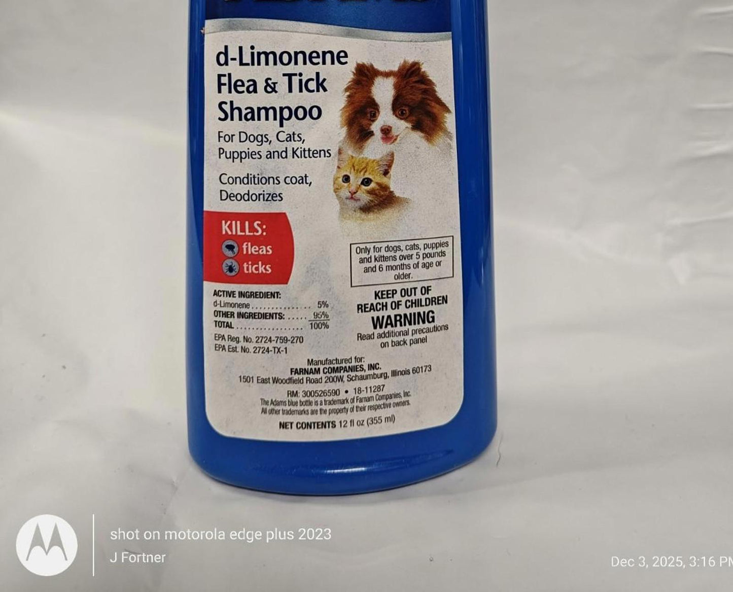 d-Limonene Flea & Tick Shampoo for dogs, cats, puppies, and kittens in a blue bottle.