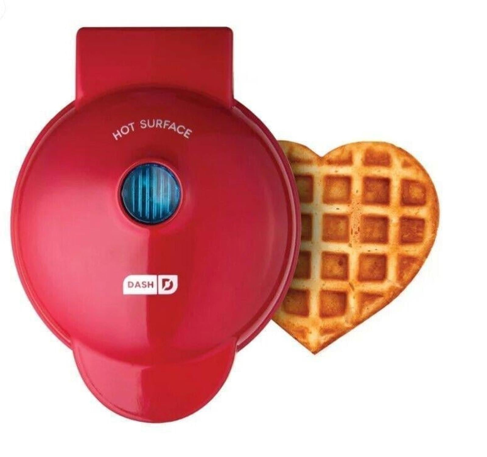 DASH heart-shaped waffle maker in red with a golden waffle beside it.