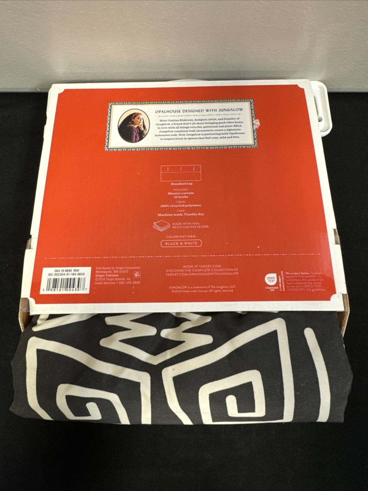 Product packaging for the Modern Heritage Wine Merlot featuring a bold black and white design.