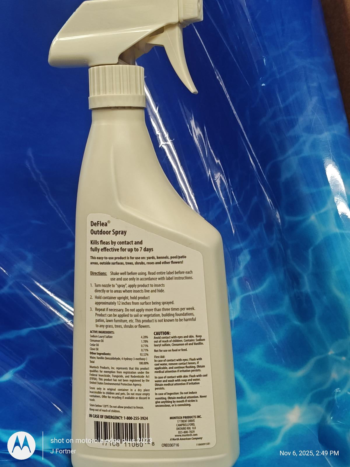 Deflea Outdoor Spray bottle with detailed instructions and ingredients on the back, designed for effective pest control.