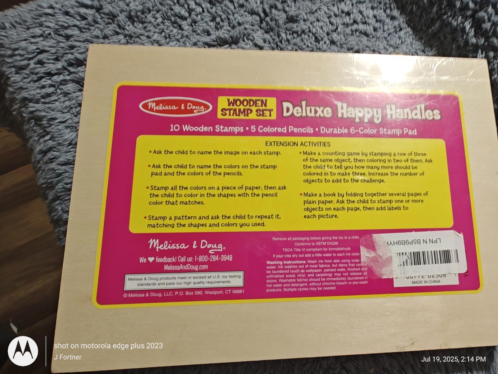 Deluxe Happy Handles stamp set featuring 10 wooden stamps and 5 colored pencils for creative fun.