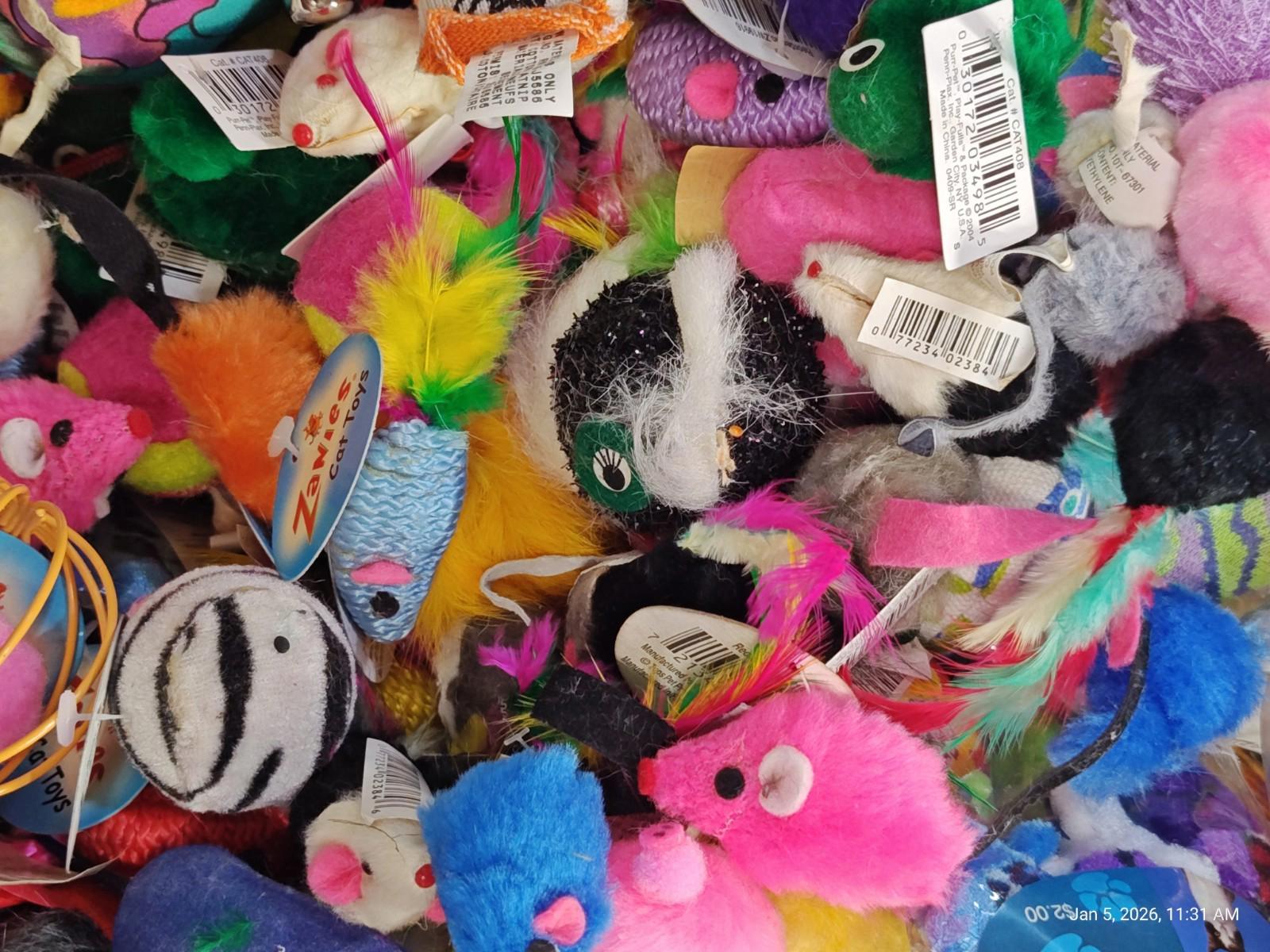 Colorful Cat Toys featuring various plush mice in vibrant colors and textures.