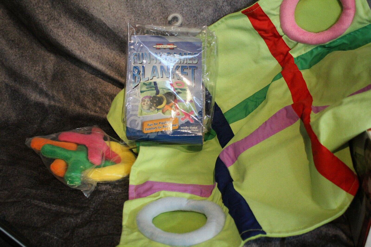 Dinosaur-themed blanket set featuring vibrant colors and playful design elements.