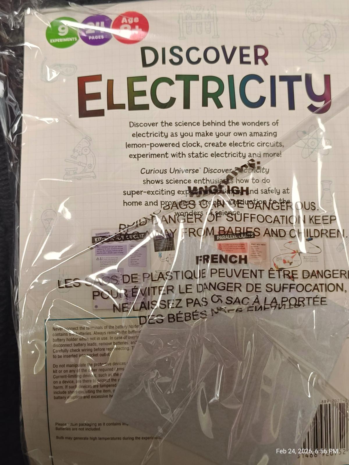 Discover Electricity educational kit featuring science experiments and safety warnings.