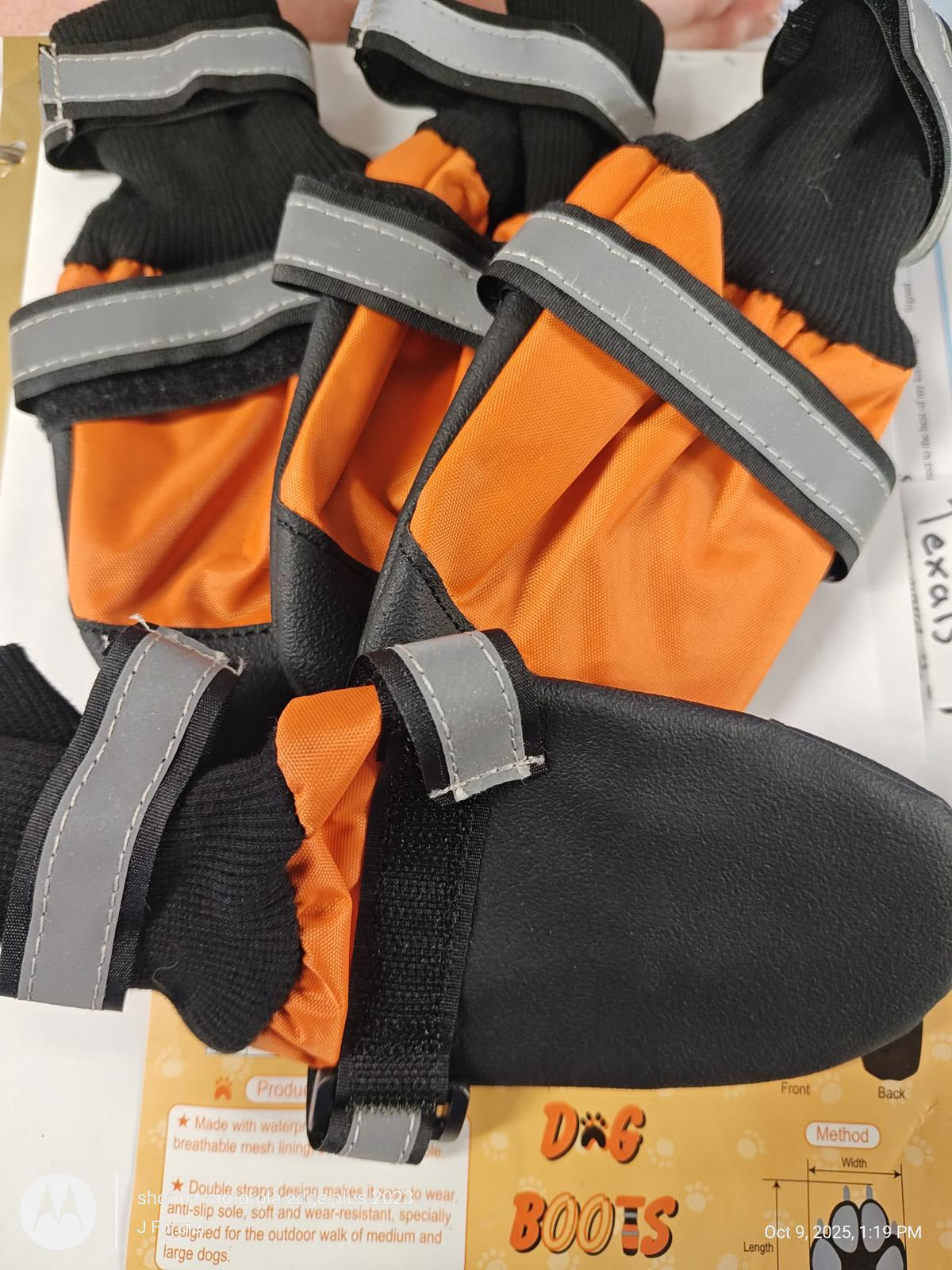 Dog Boots featuring orange and black design with adjustable straps for secure fit.
