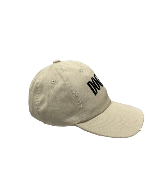 Dog cap in beige color with black lettering, perfect for pet lovers.