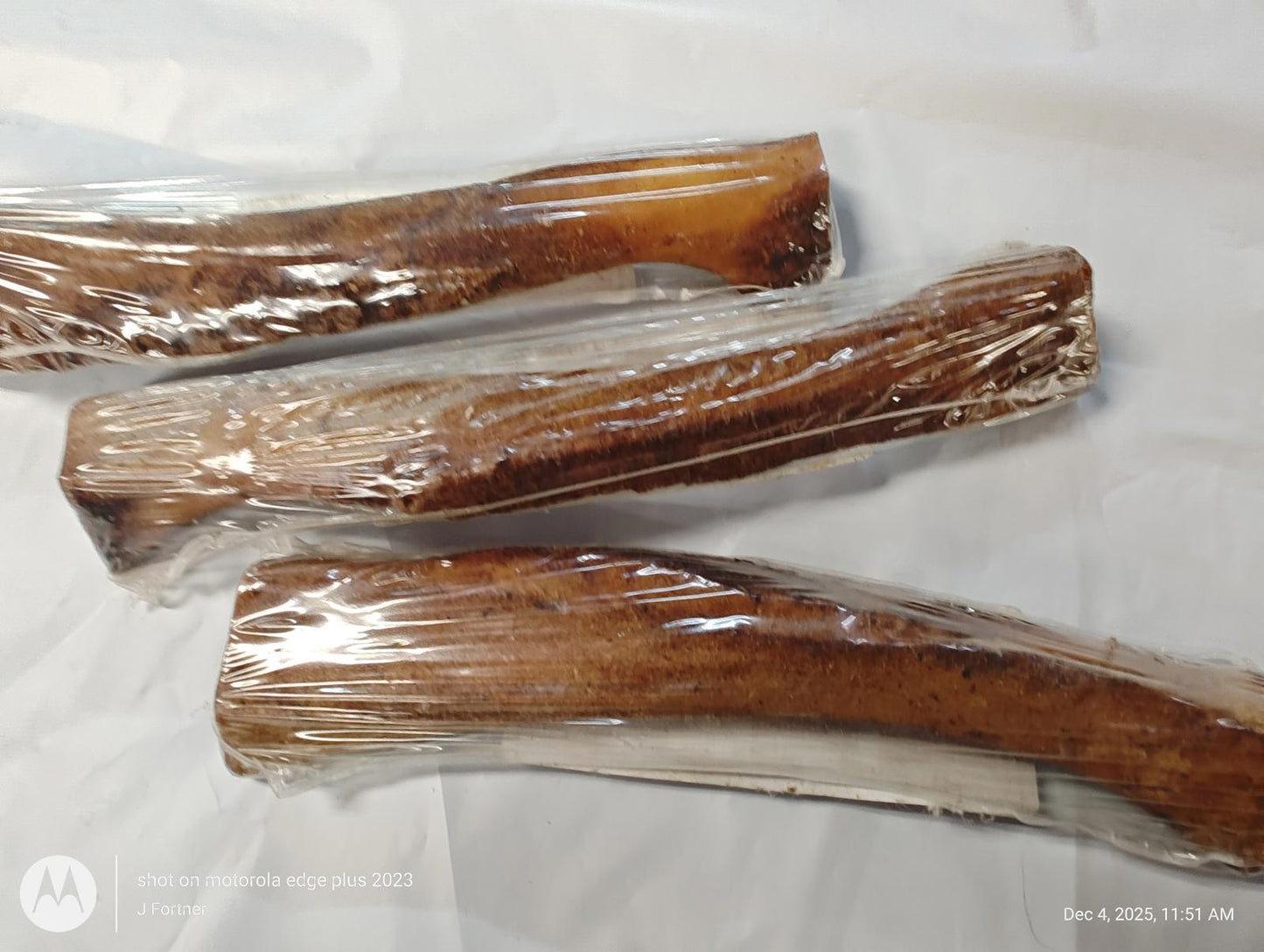 Dog Chew Bones wrapped in plastic for freshness, ideal for dental health and playtime.