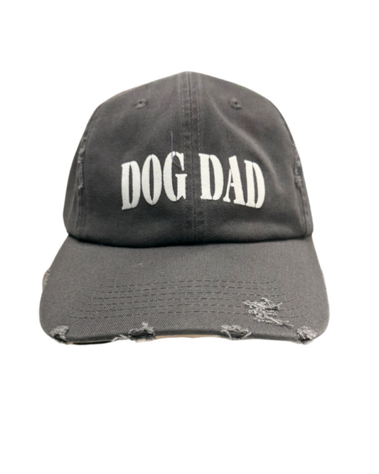 Dog Dad cap featuring a distressed black design with white lettering.