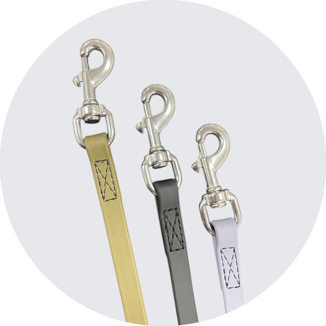 Dog Leash Set featuring gold, gray, and white colors with sturdy metal clips.