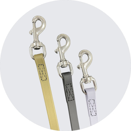 Dog Leash Set featuring gold, gray, and white colors with sturdy metal clips.
