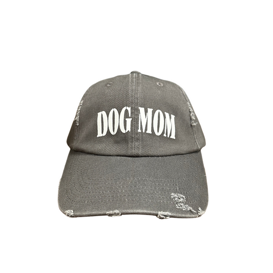 Dog Mom cap featuring distressed gray fabric and bold white lettering.