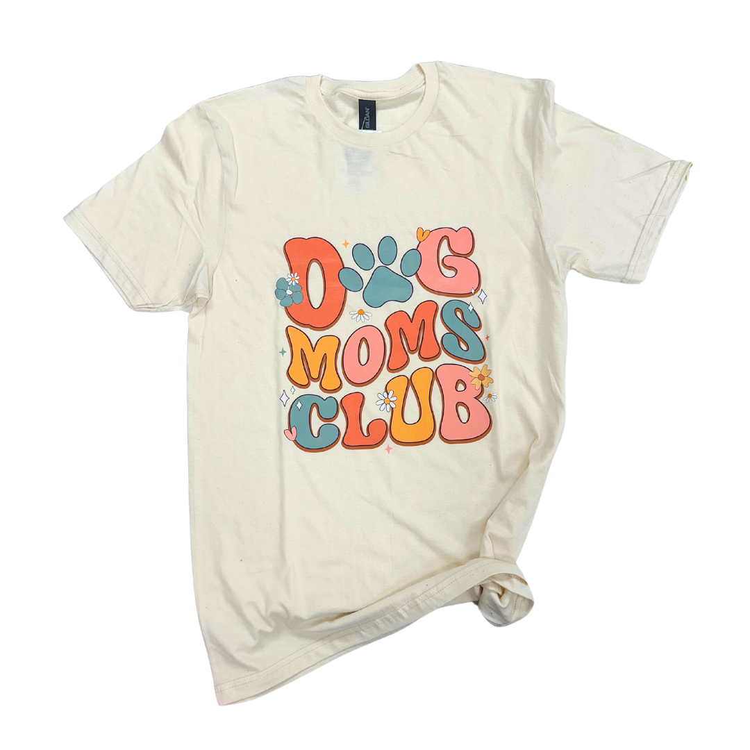 Dog Moms Club t-shirt featuring colorful lettering and a paw print design.