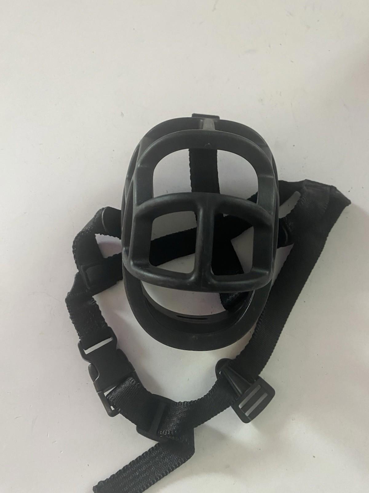 Dog muzzle for training, featuring a durable design and adjustable straps.