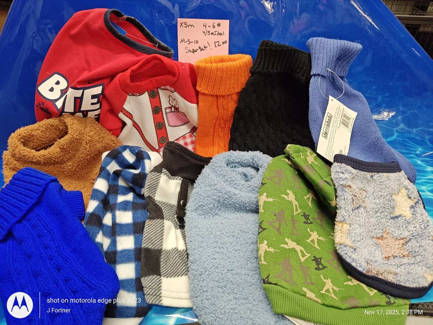 Pet Sweaters Set featuring various colors and patterns, including red, orange, and blue options.