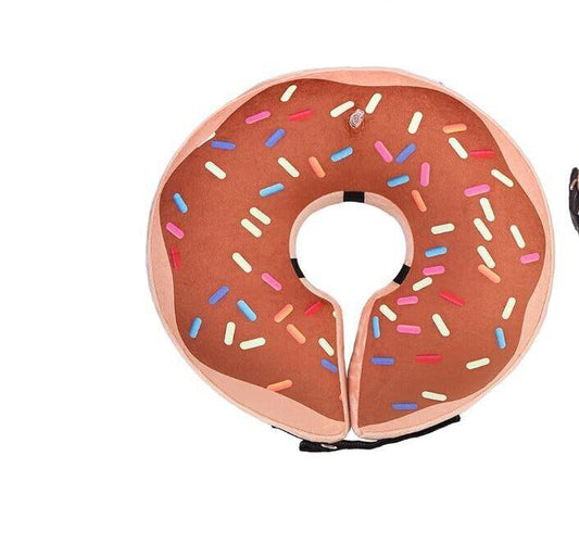 Donut-shaped neck pillow with colorful sprinkles for comfort and support.