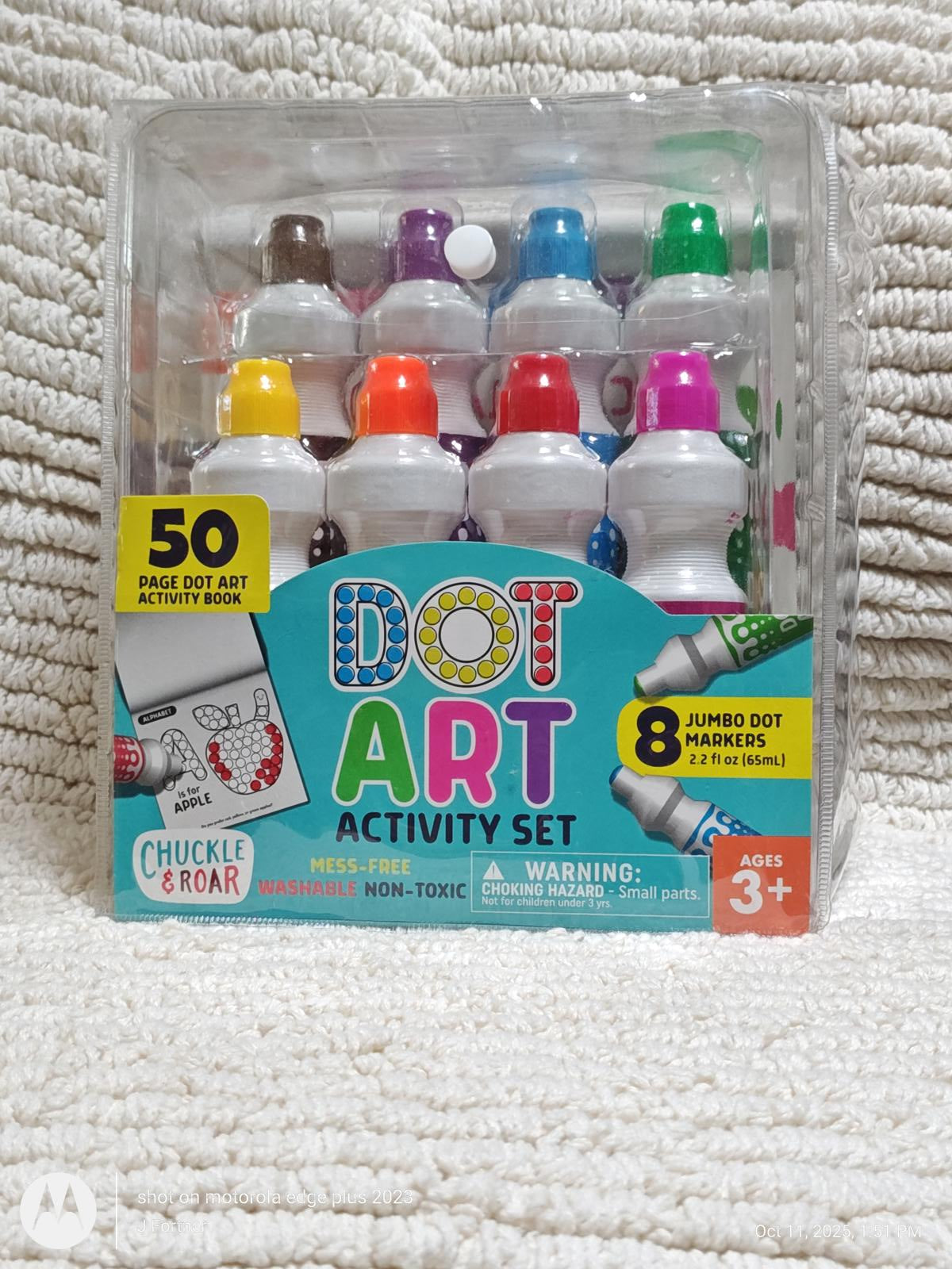 Dot Art Activity Set with 50-page dot art activity book and 8 jumbo dot markers in vibrant colors.