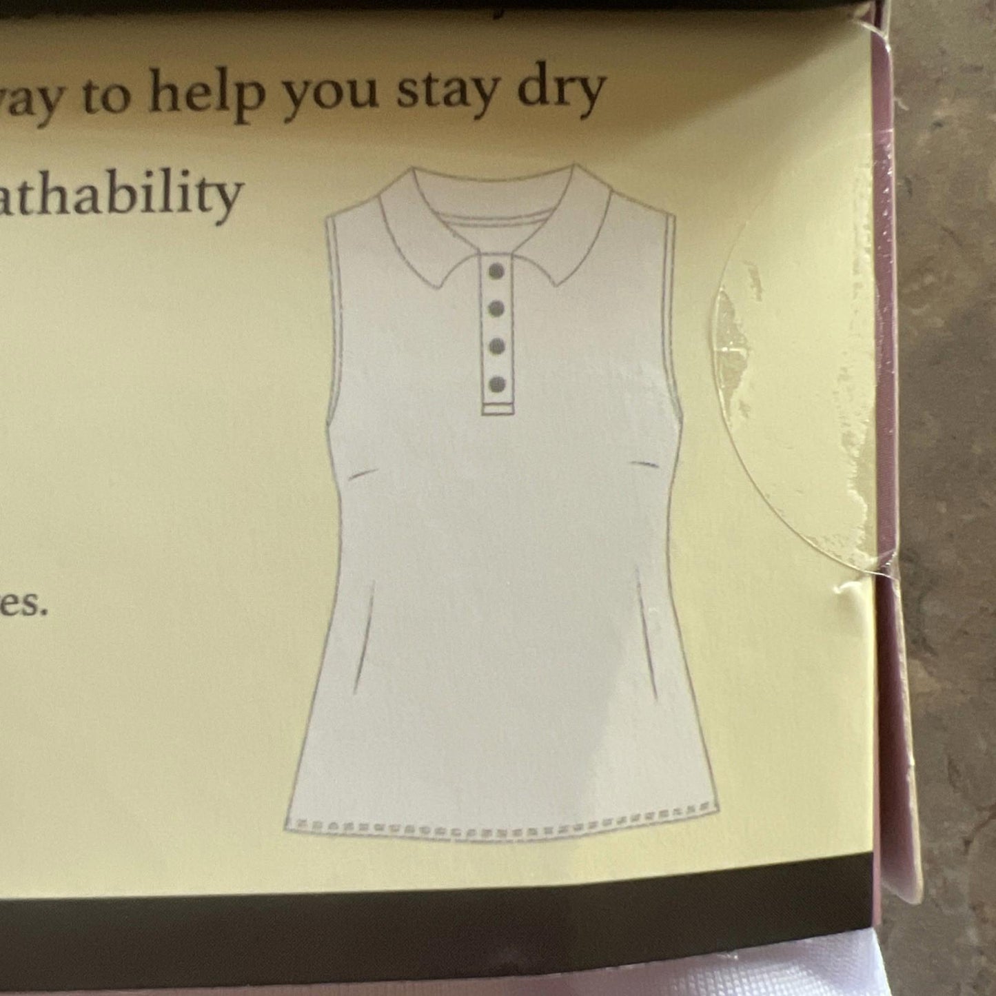 DryFit Sleeveless Polo Shirt features a classic collar and button placket for comfort.
