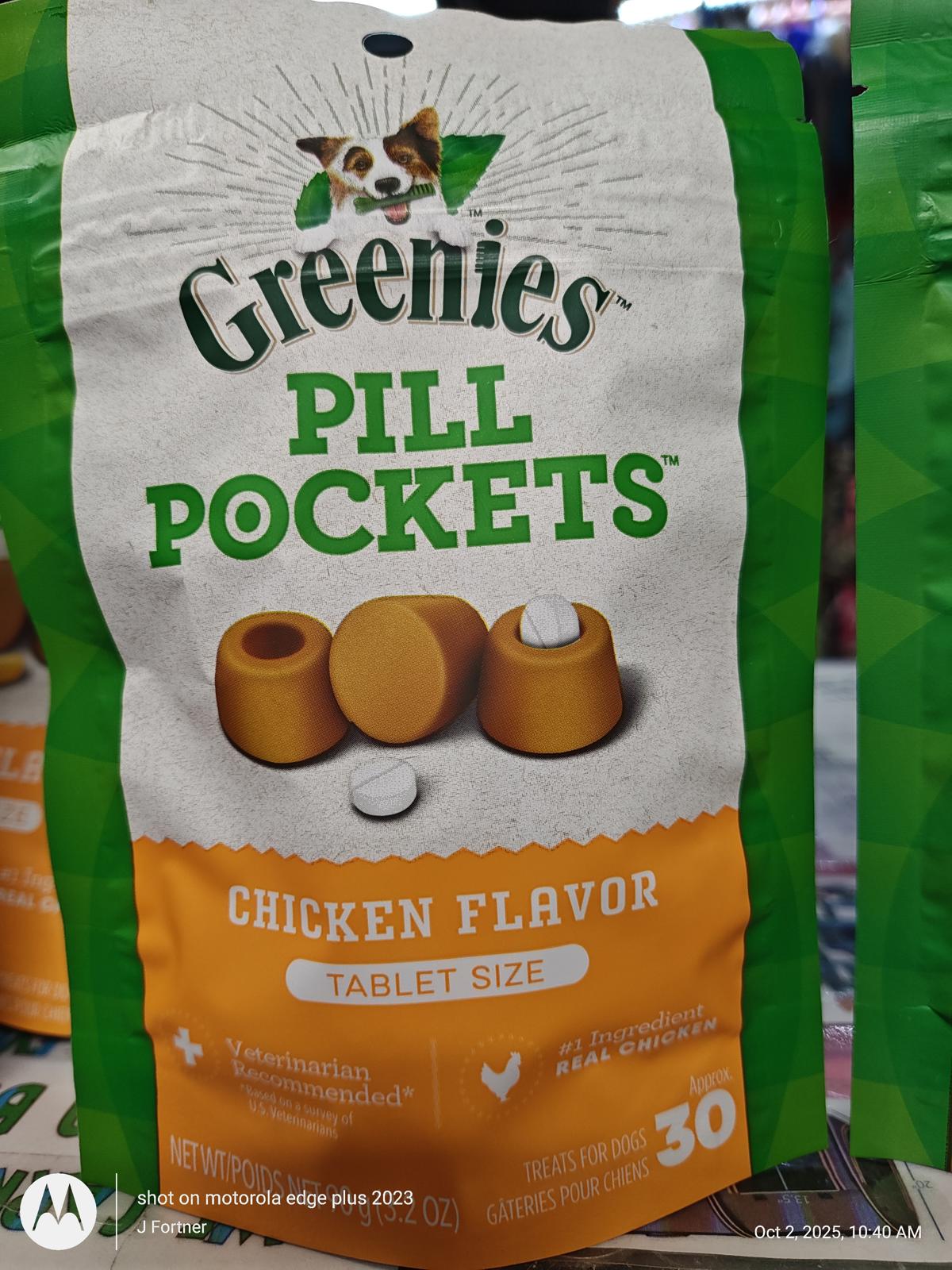 Greenies Pill Pockets chicken flavor tablet size packaging with orange and green design.