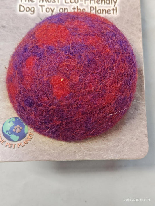 Eco-Friendly Dog Toy featuring a round, colorful design in red and purple hues.
