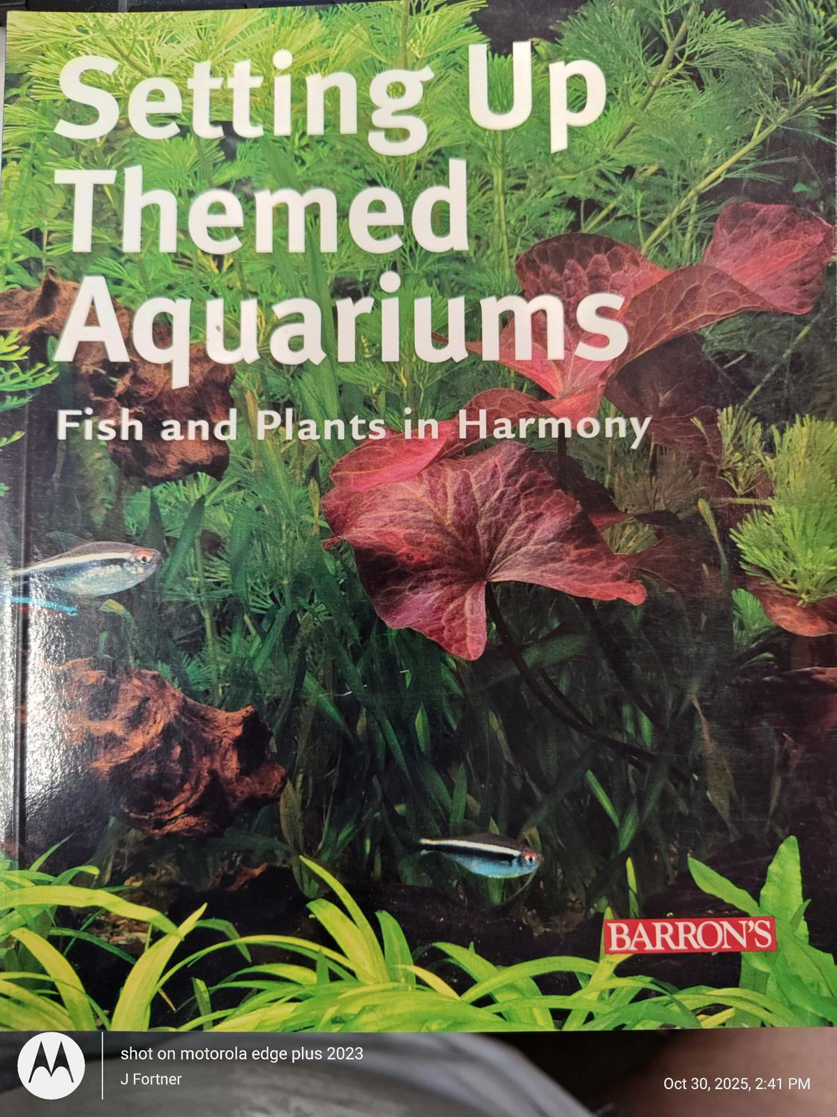 Setting Up Themed Aquariums book cover featuring lush aquatic plants and fish.