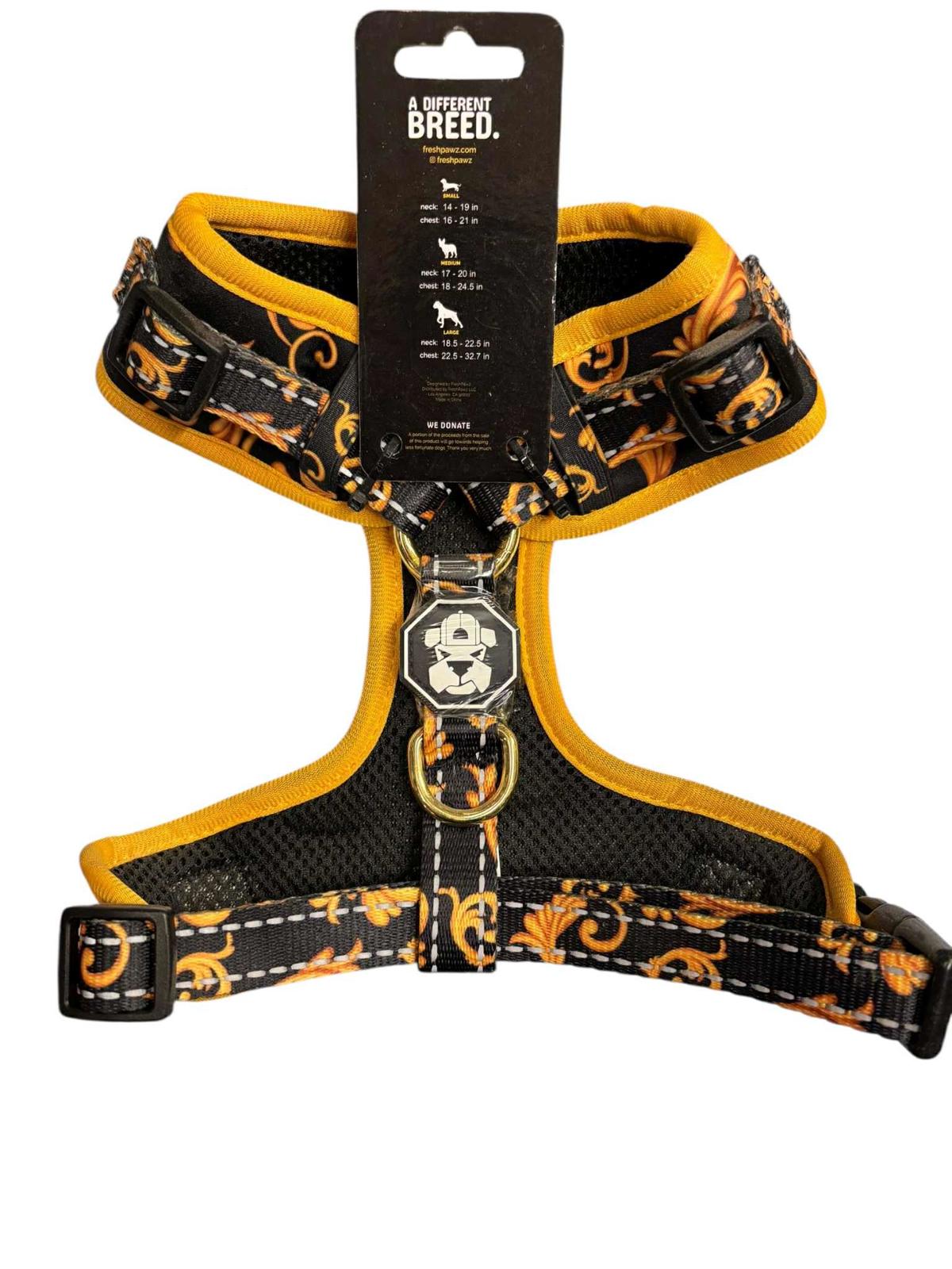 Skull and floral design dog harness featuring adjustable straps and breathable mesh.