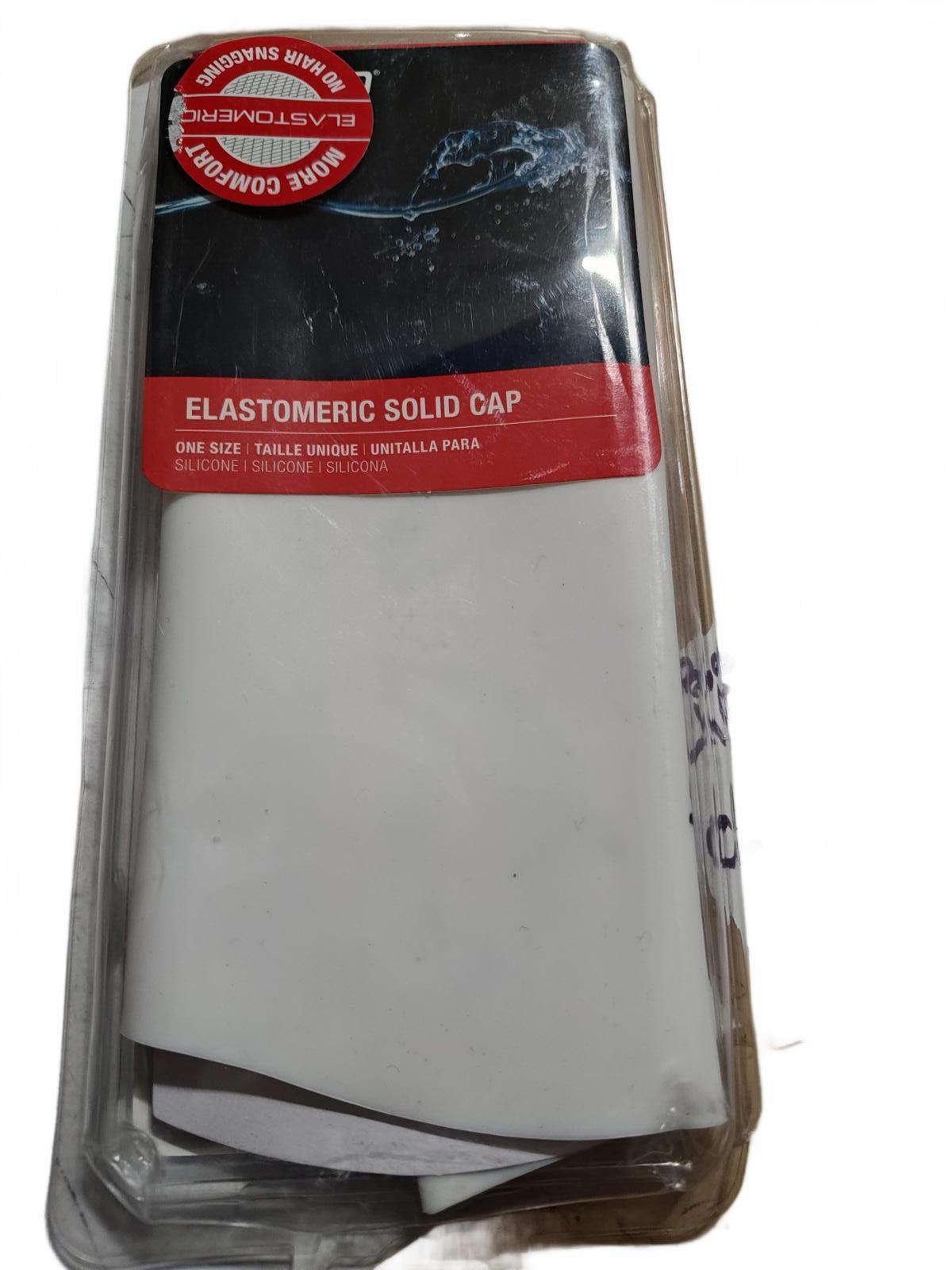 Elastomeric solid cap in packaging, designed for table use and protection.