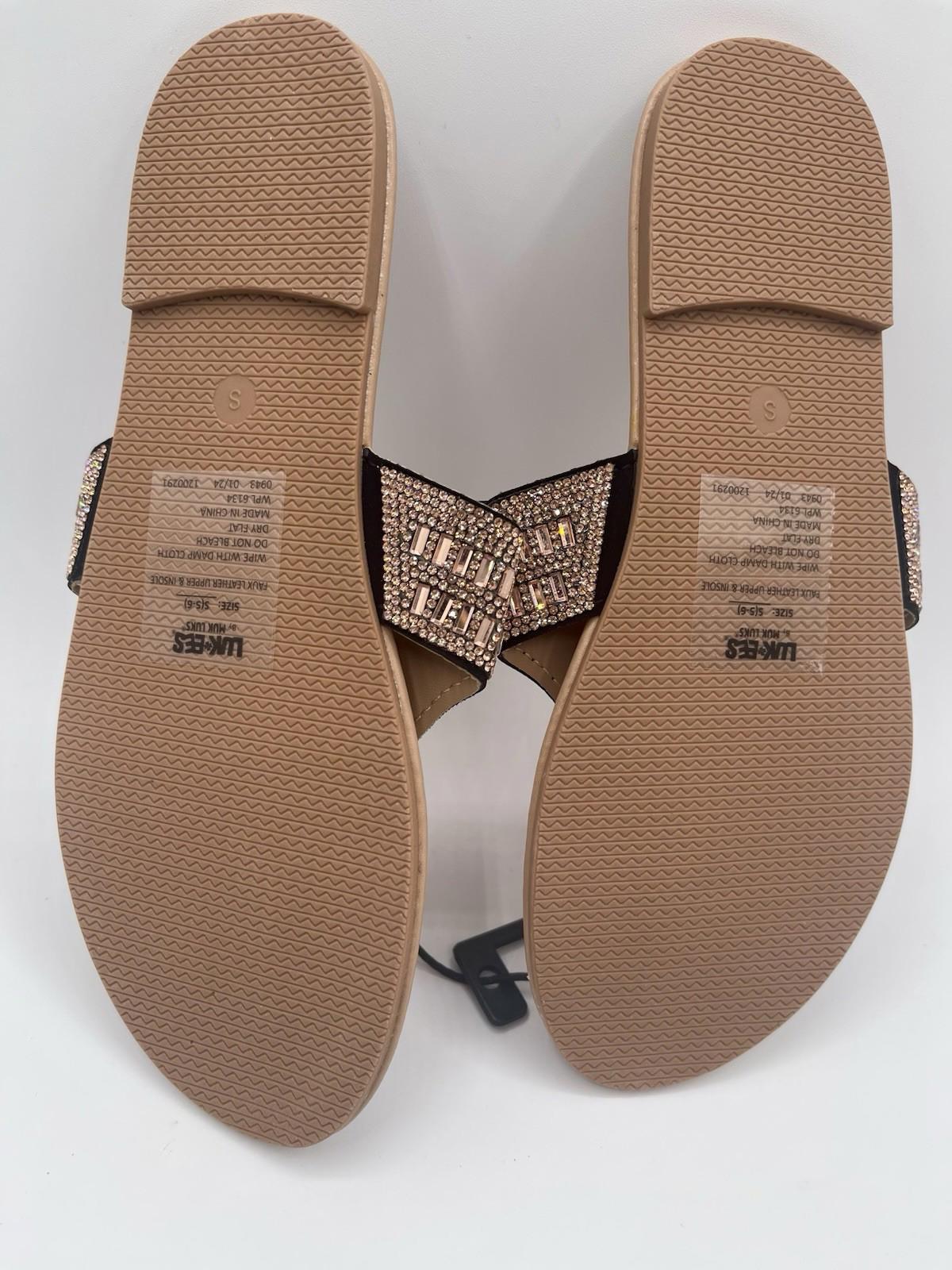 Elegant Rhinestone Slide Sandals featuring a stylish design and comfortable sole.