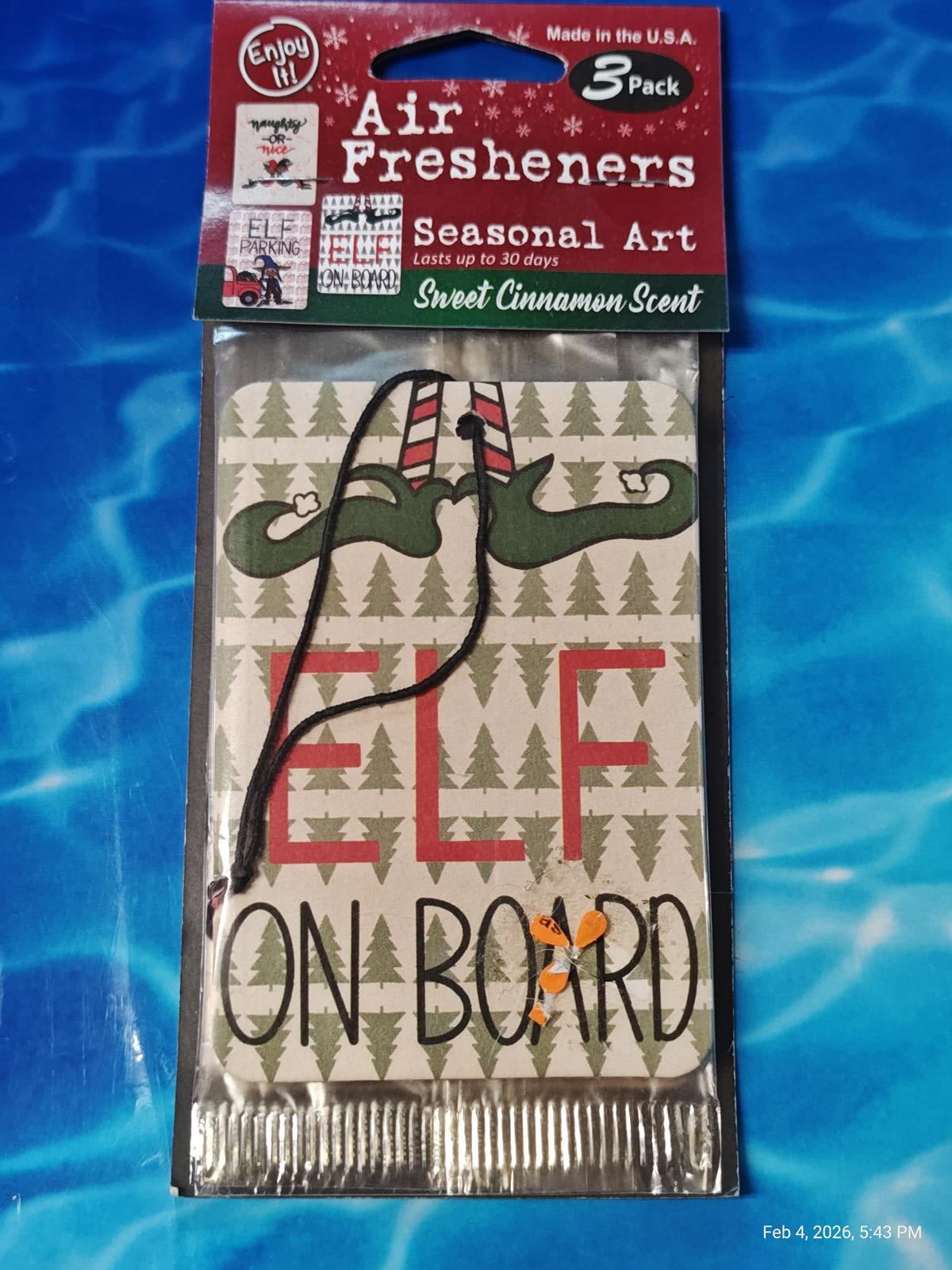 Air Fresheners featuring seasonal art with 'Elf On Board' design and sweet cinnamon scent.