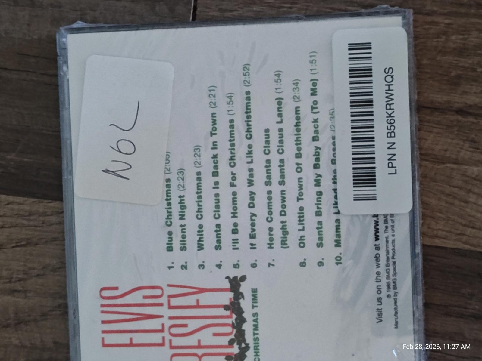 Elvis Presley CD featuring classic hits like 'Can't Help Falling in Love' and 'Jailhouse Rock'.