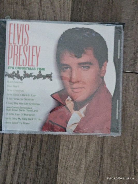 Elvis Presley It's Christmas Time CD cover featuring a portrait of Elvis with a red jacket.