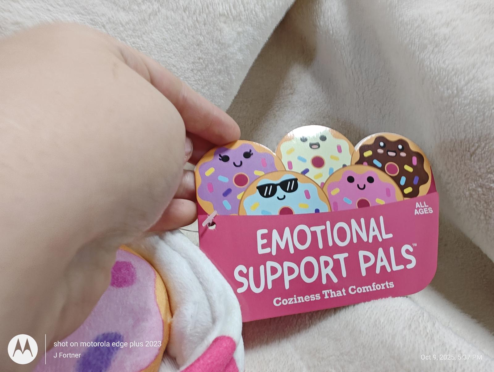 Emotional Support Pals plush toy featuring colorful donut characters with cute faces.
