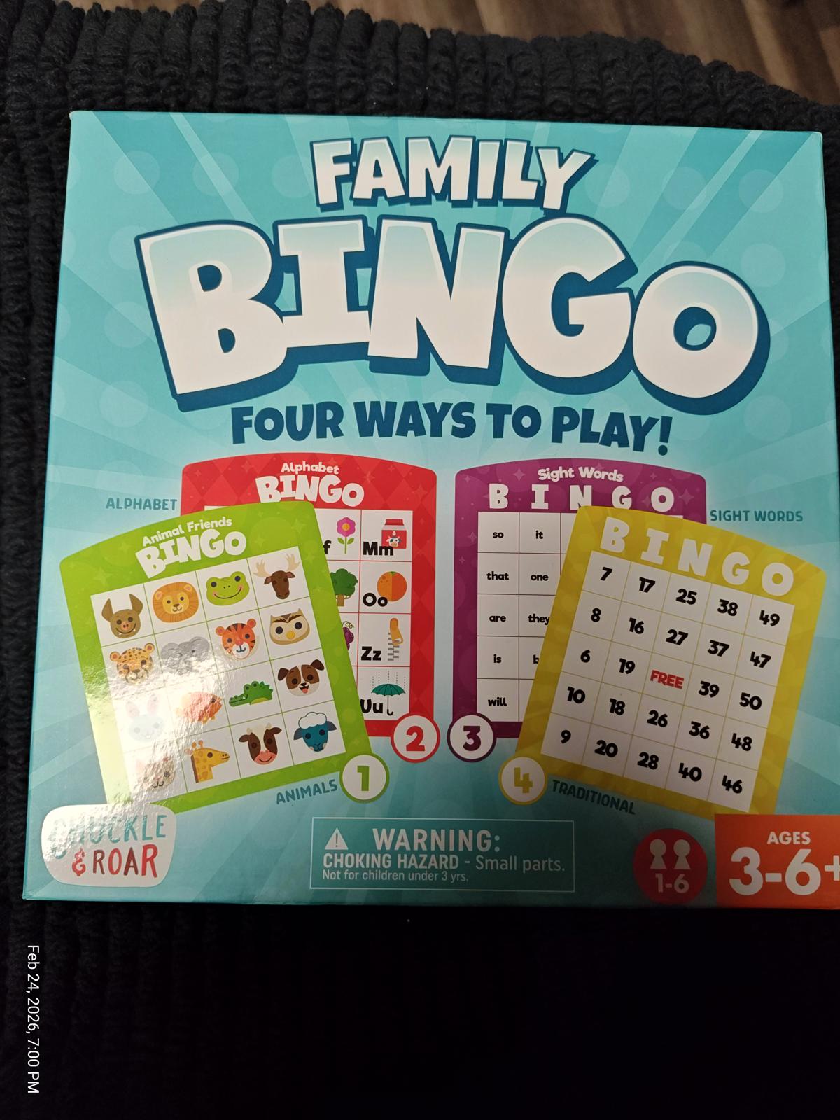 Family Bingo game box featuring colorful cards and instructions for four ways to play.