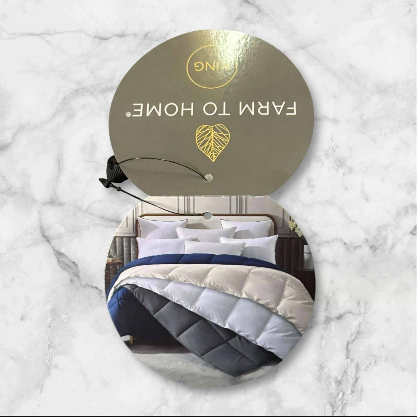 Farm to Home comforter featuring a stylish gray and white design, perfect for cozy bedding.
