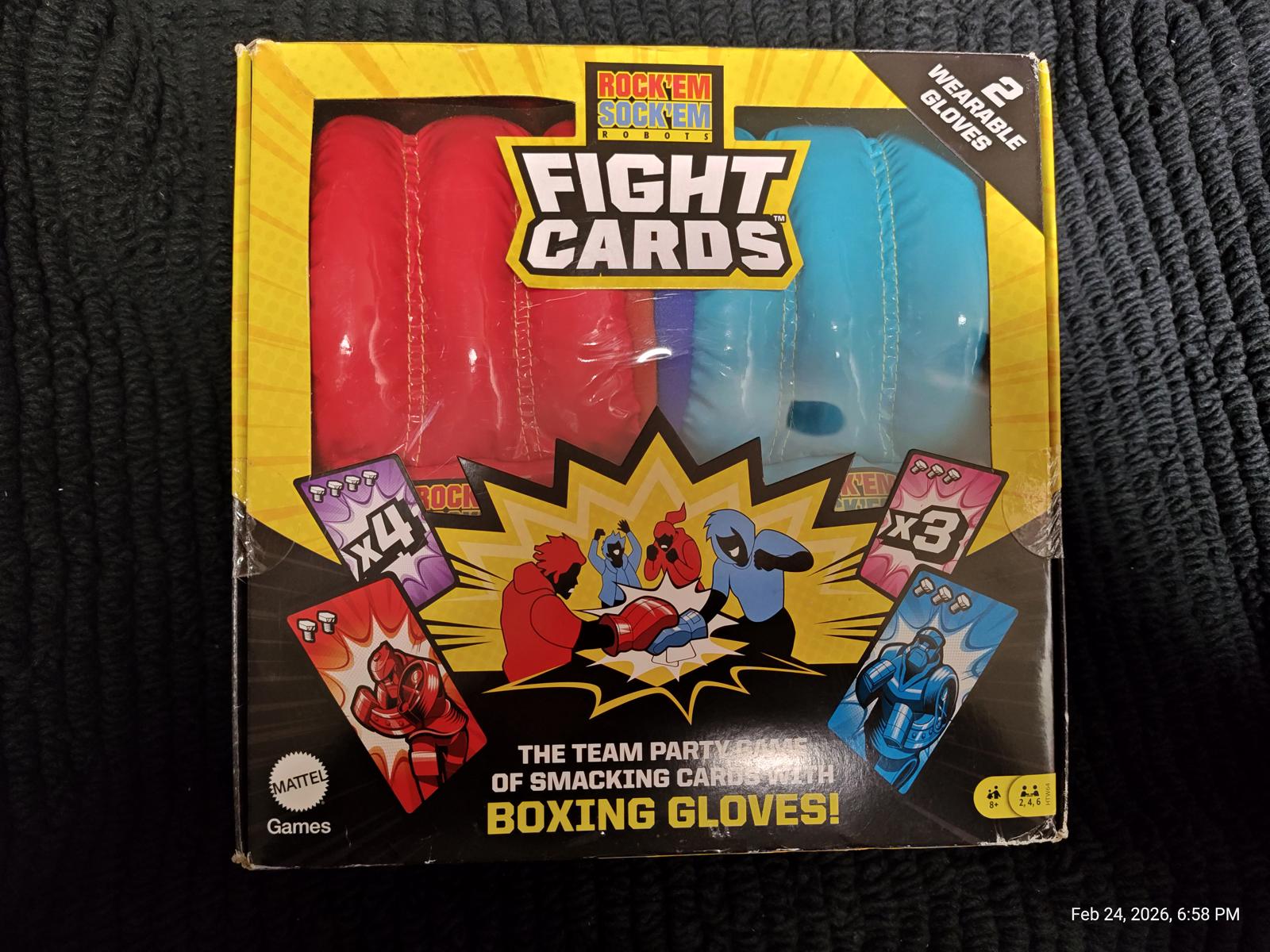 Fight Cards boxing gloves set in red and blue packaging with game cards visible.