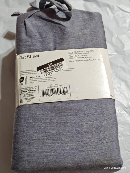 Flat Sheet in gray color, neatly packaged with a label showing care instructions.