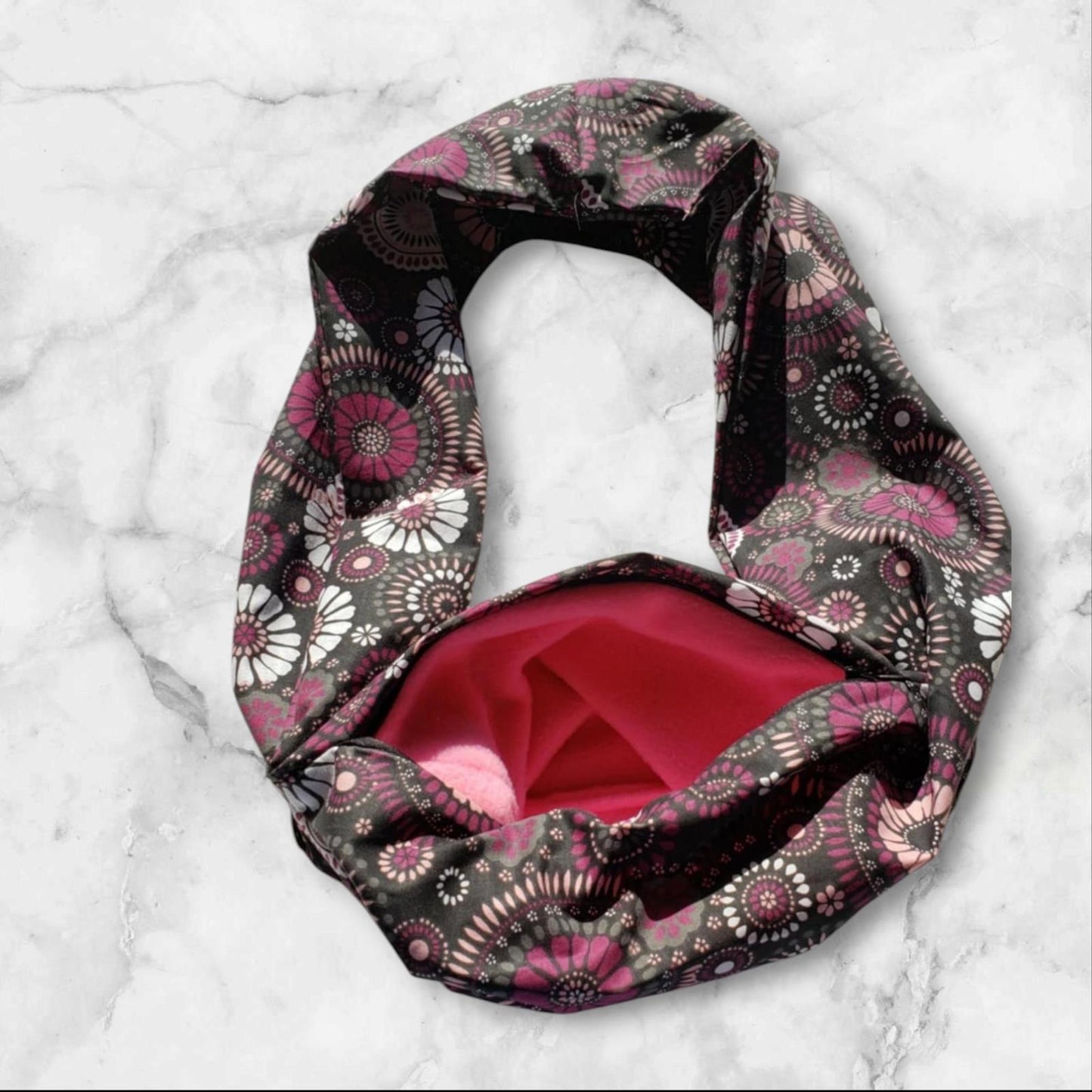 Floral Infinity Scarf featuring vibrant pink and black patterns with a red interior.