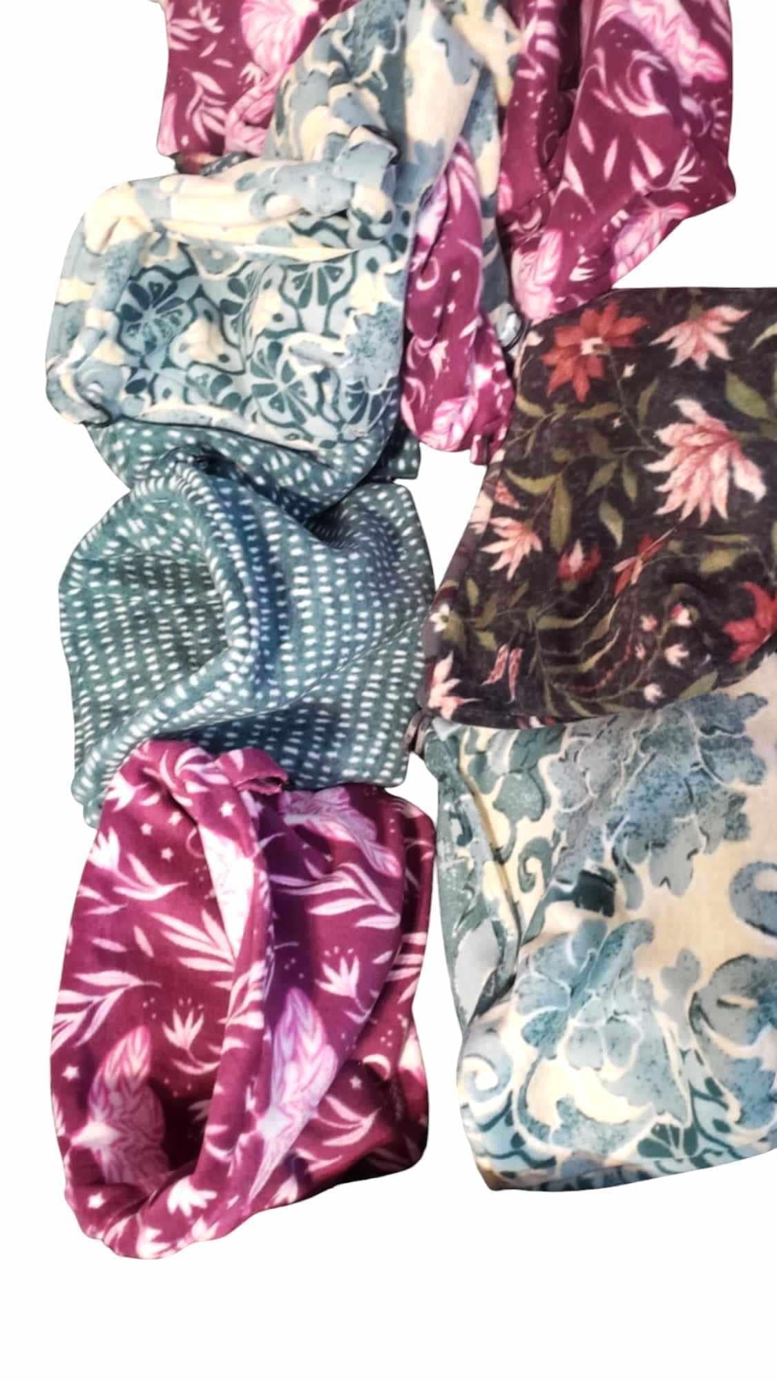 Floral Scrunchies set featuring various patterns and colors including purple, teal, and floral designs.